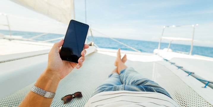 Phone In Hand On Deck